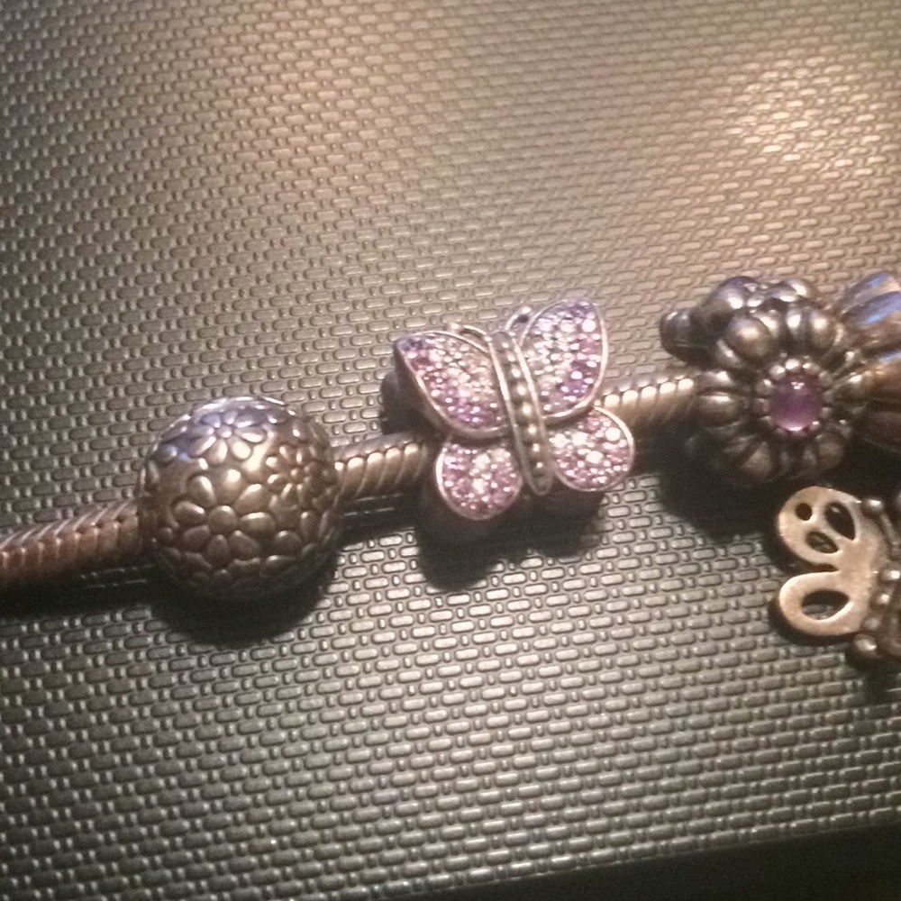 Pandora sparkling butterfly charm purple CZ only.